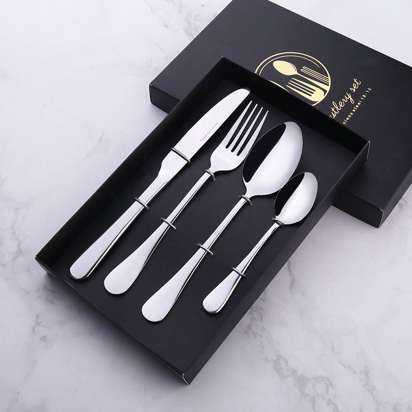 Four stainless steel cutlery